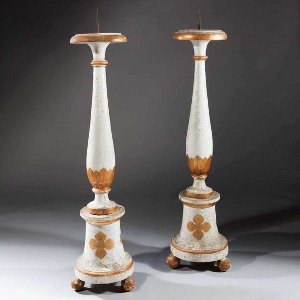 Pair of 18th century white and gold torcheres